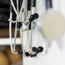 A stethoscope hanging on a wall.