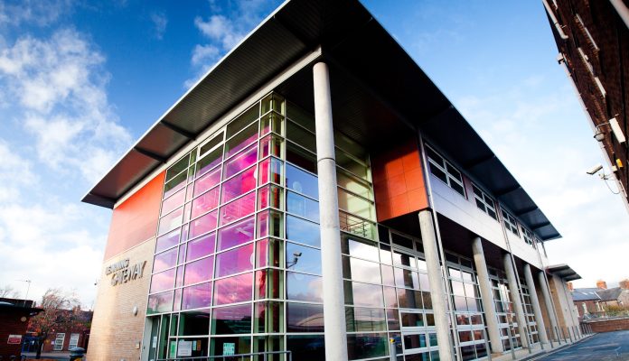 A building with a colorful glass facade.