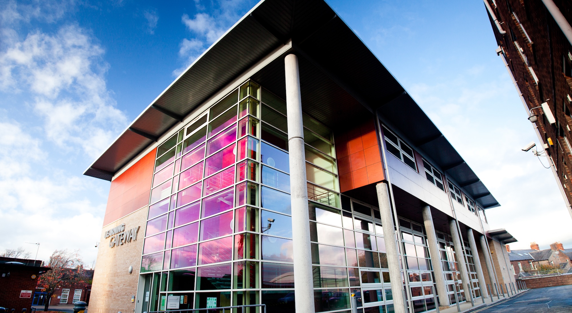 A building with a colorful glass facade.